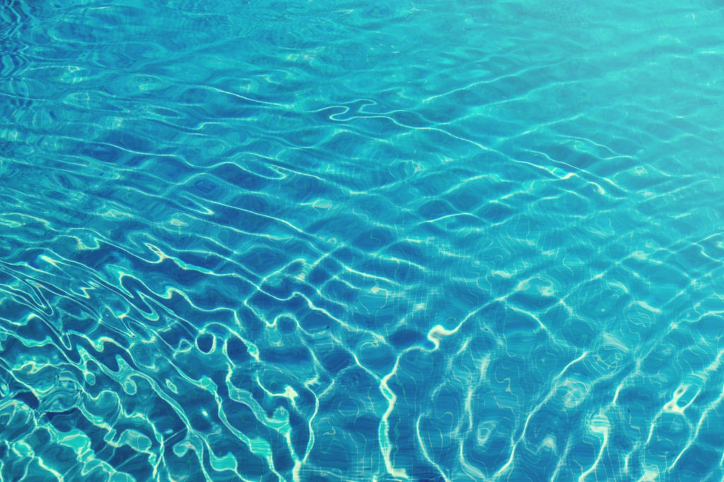 clear blue swimming pool water